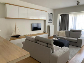 Perfect gelegen appartement met gratis overdekte staanplaats